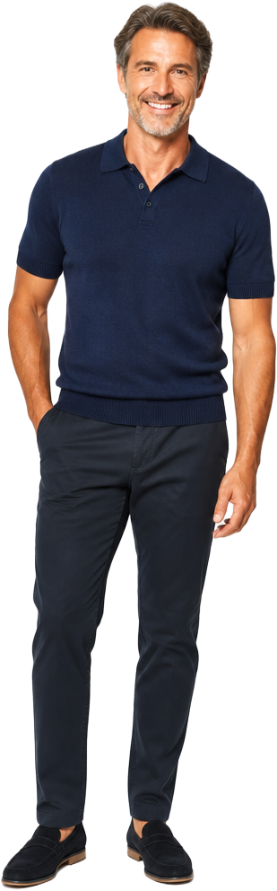 Smiling man in a navy polo standing in a relaxed pose